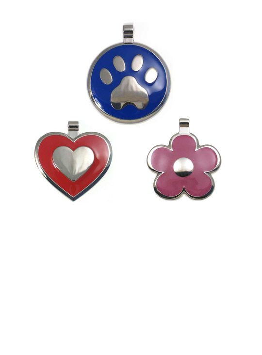 A blue paw enamel jewelry tag, a red heart shaped enamel jewelry tag, and a pink flower shaped enamel jewelry tag.